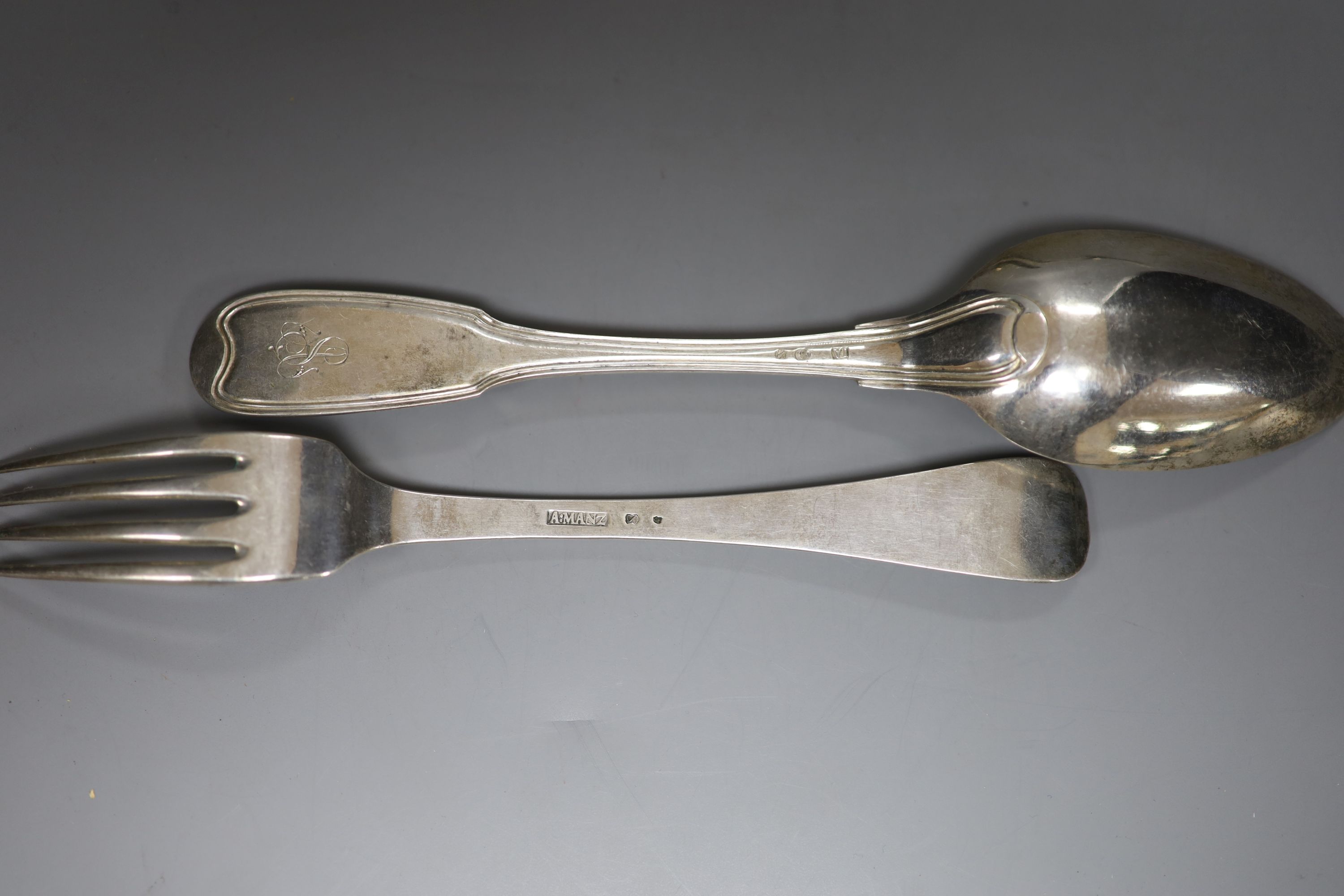 A set of six continental white metal dessert forks by A.Manz and four white metal table spoons
